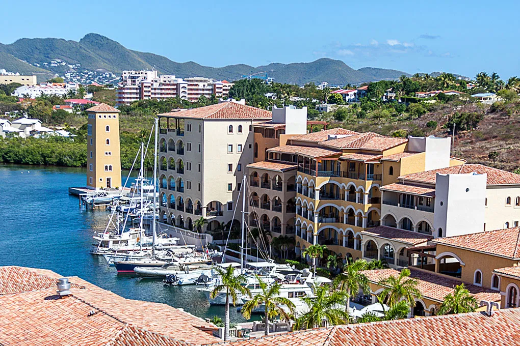 Aerial view of the Porto Cupecoy marina and its Mediterranean-style buildings